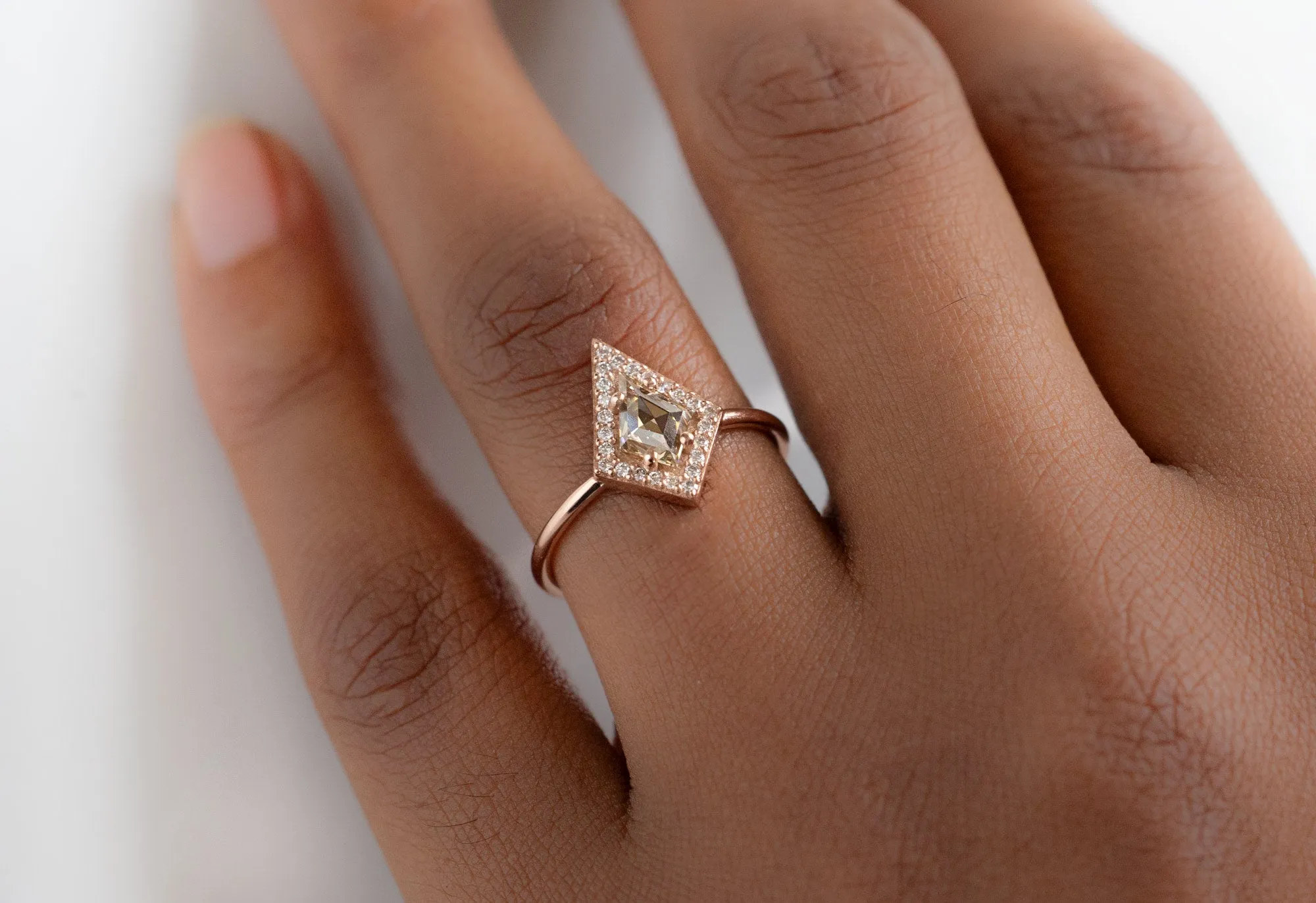 The Dahlia Ring with a Kite-Shaped Champagne Diamond