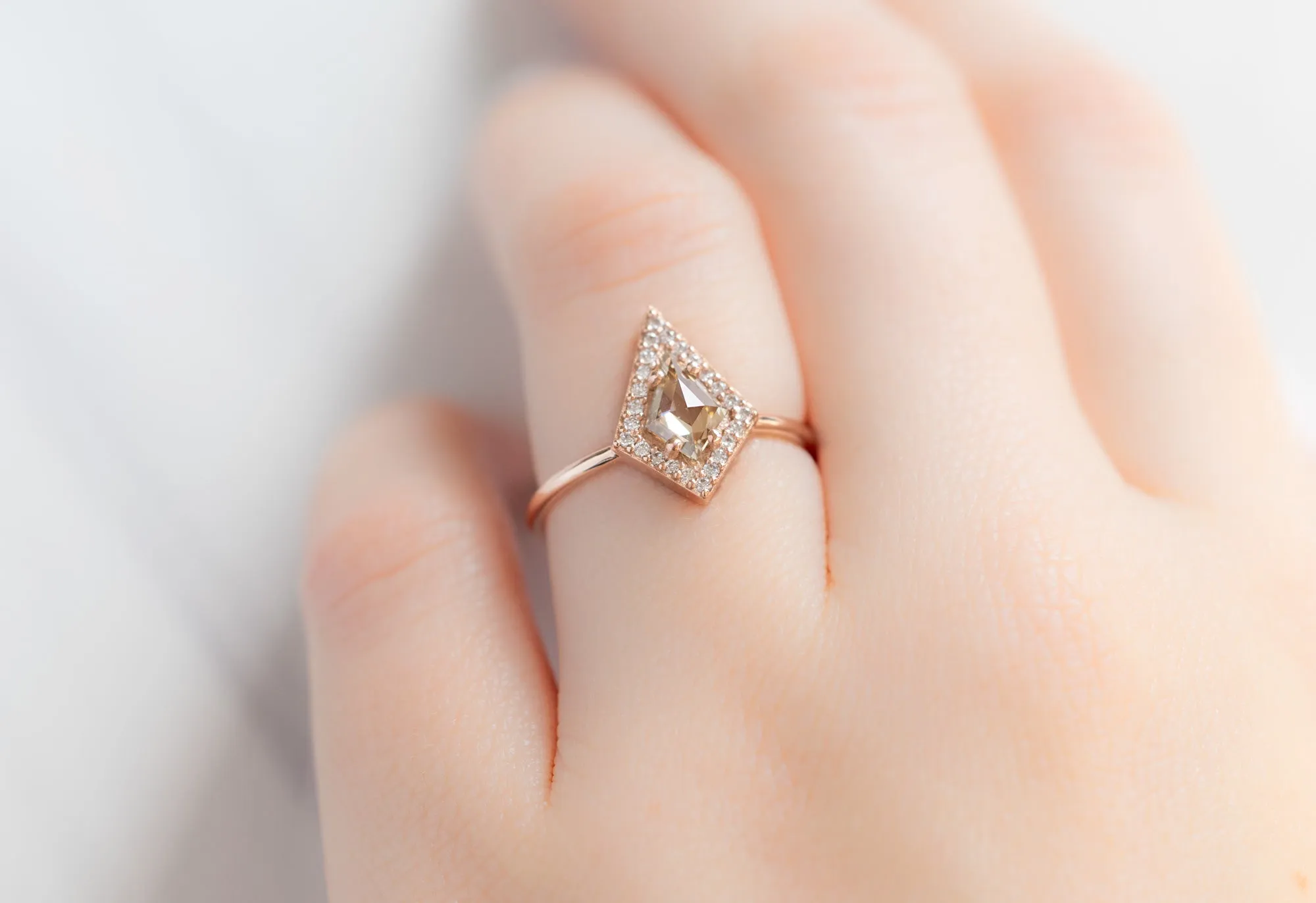 The Dahlia Ring with a Kite-Shaped Champagne Diamond